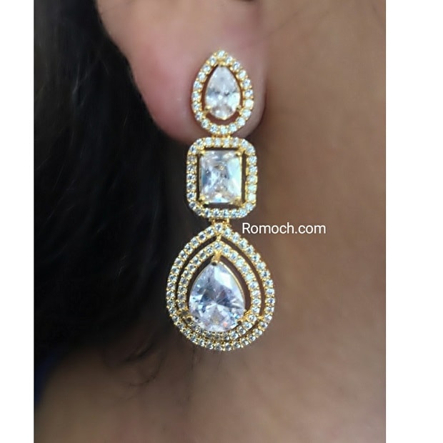 Trendy CZ stone golden tone dangle earrings