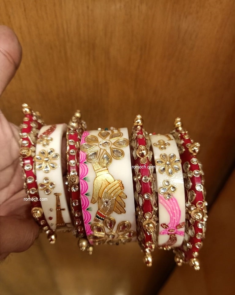 Indian meenakari bridal chura holding hands shehnai design 