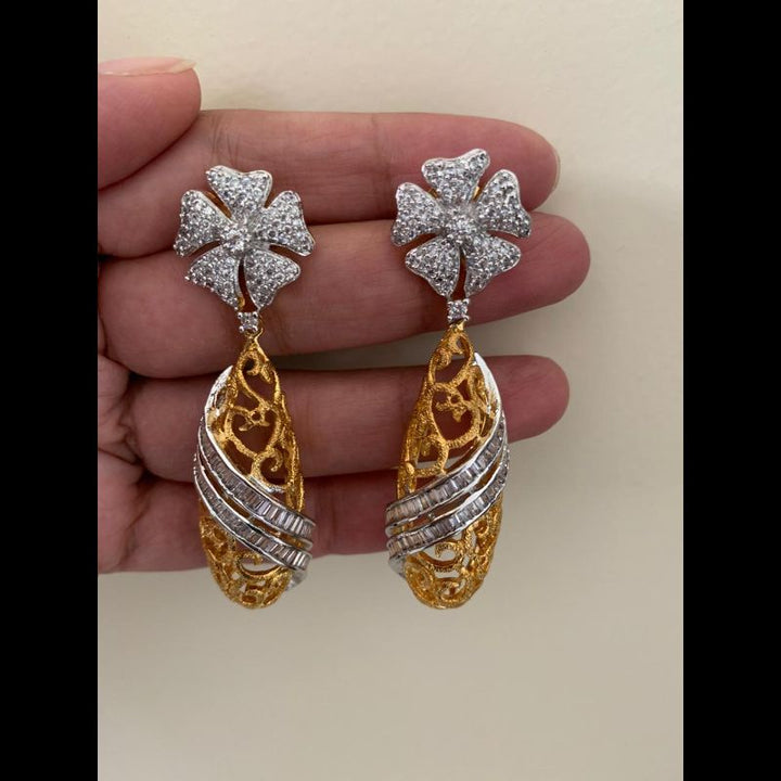 CZ stone goldegnn tone earrings intricate design