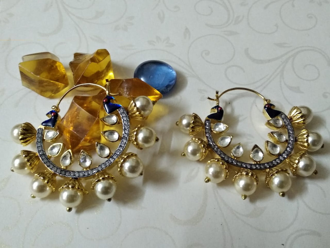 Elegant peacock design Kundan and CZ stone earrings