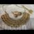 Indian Kundan necklace set elegant gold tone Bollywood style with tikka
