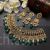 Victorian look Jadau Kundan jewelry set with pan shape green drops