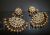 Kundan chandbali earrings with golden pearl drops