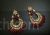 Simple Kundan earrings with ruby bead drops