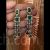Emerald stone and american diamond long earrings