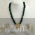 Green tumble necklace Vilandi Kundan sun design pendant and earrings set