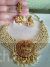 Golden pearls studded Laxmi round pendant center antique set