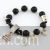 Black beads bracelet with Eiffel tower charm