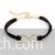 Simple black infinity bracelet