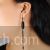 Simple black tassle earrings