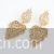 Golden hollow design earrings