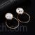 Circular marble stone decorated stud earrings