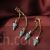 Beads decorated rivet tassel earrings