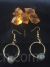 Golden round multiple black stone earrings