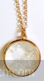 Circular shaped golden pendant with long chain
