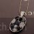 Black oval shaped pendant necklace